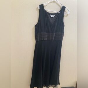 Pretty Black 100% silk dress in Size 16 by Maggy London